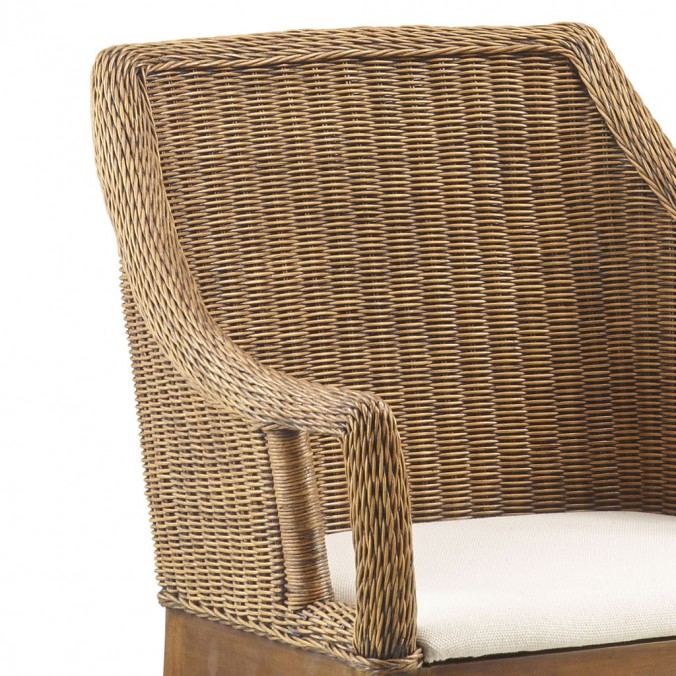 Sillón de ratán natural asiento tapizado y patas caoba 58x60x88h